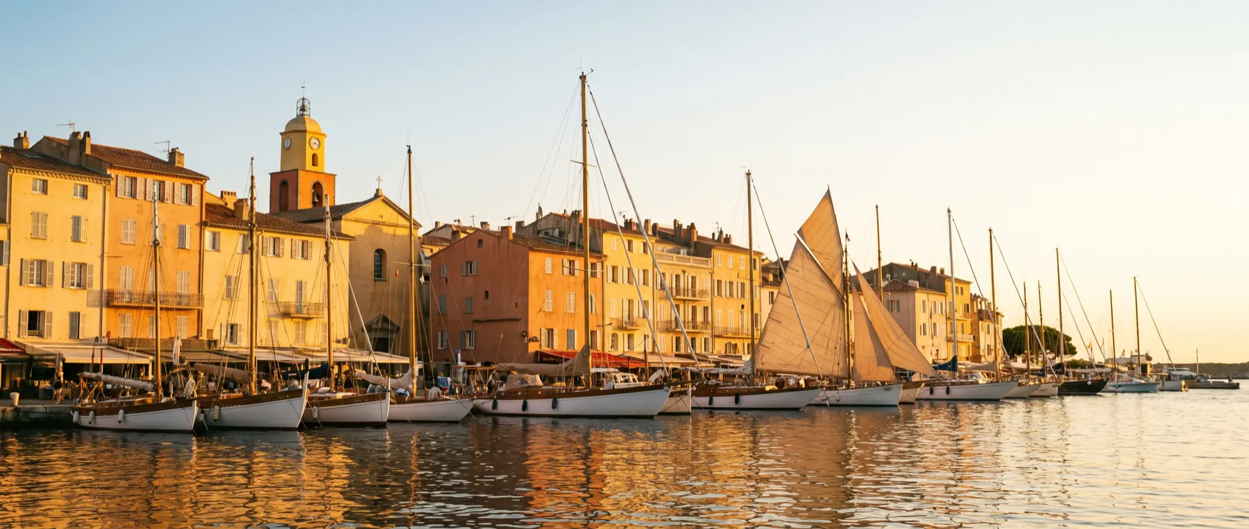 The old port of Saint-Tropez approached from the water.