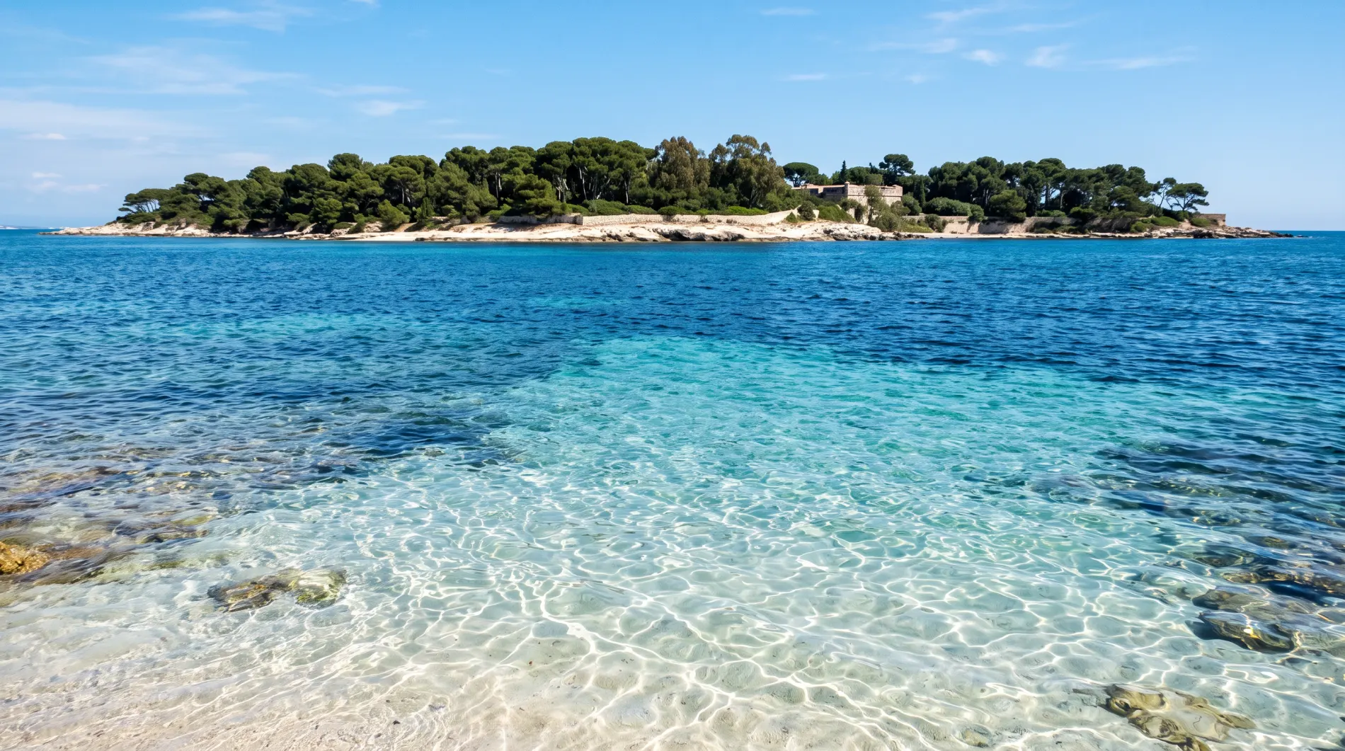 The clear water off the Lerins Islands at midday.